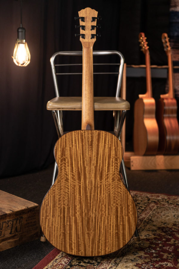 Figured walnut back of the Washburn Vella Tono Series Novo S9 Studio Charcoal Burst Acoustic Guitar